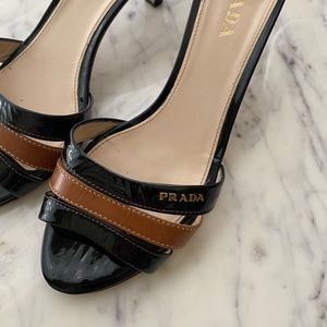 Prada low heeled slip on sandals